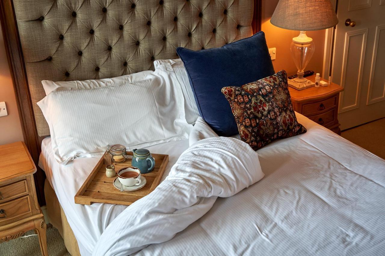 科斯罕 梅休因阿姆斯宾馆酒店 外观 照片 A bed with a duvet